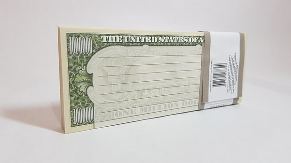 Bloc-notes de faux billets de 1mln. dollars américains